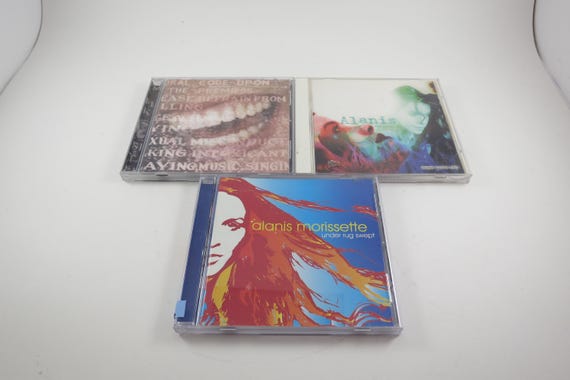 Alanis Morissette CD's Jagged Little Pill Under Rug Swept Supposed Former Infatuation Junkie Sold Individually