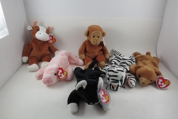 Collection of Six TY Beanie Babies Bessie Squealer Zip Cubbie Blizzard Bongo All MWMT