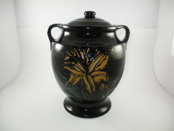 Vintage Black Double Handled Pottery Cookie Jar with Embossed Yellow Flower Origina Lid Excellent Condition Made in the USA