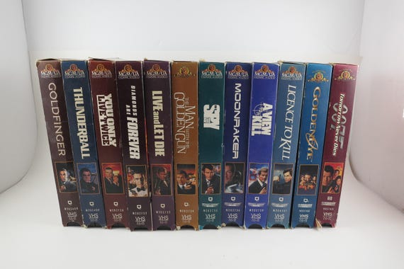Collection of 12 MGM James Bond 007 VHS Tapes Films Goldfinger Moonraker More