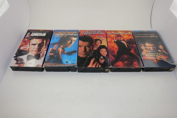 Collection of 5 James Bond 007 VHS Tapes Tomorrow Never Dies Living Daylights Golden Eye Diamonds Are Forever World Is Not Enough Excellent