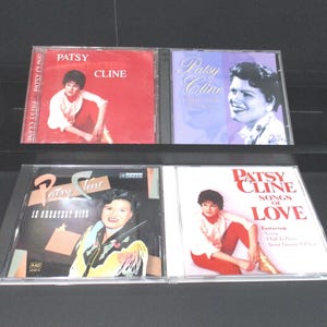 May include: Four compact discs featuring Patsy Cline, a country music singer. The albums are titled "Patsy Cline Greatest Hits", "Patsy Cline 20 Greatest Hits", "Patsy Cline Songs of Love", and "Patsy Cline Greatest Hits".