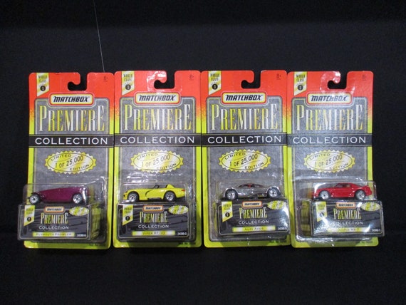 Collection of Four 1995 Matchbox Premiere Collection Series One Cars New in Package Viper Prowler RX-7 Audi Avus