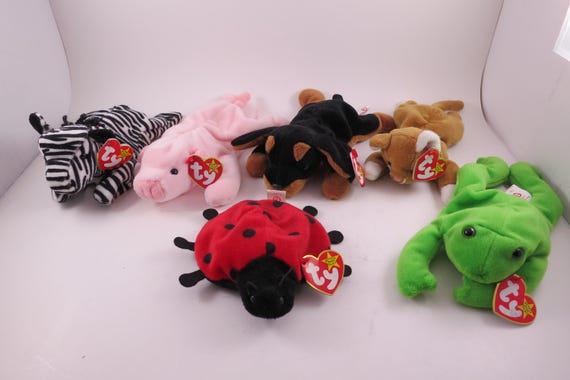 Collection of Six TY Beanie Babies Nip Legs Doby Ziggy Squealer Lucky All MWMT