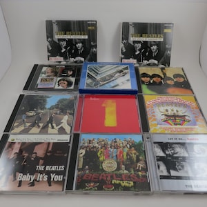 Beatles CD&#39;s Rubber Soul 1 Love Yellow Submarine Greatest Hits Anthology White Album Live at BBC Rare Photos More Sold Individually