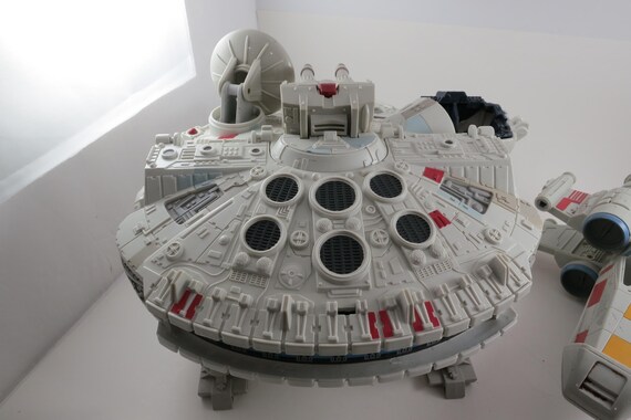 Pair of Vintage 2001 Star Wars Hasboro Millennium Falcon Ship and Galactic X Wing Fighter Both In Working Condition Sold As Shown