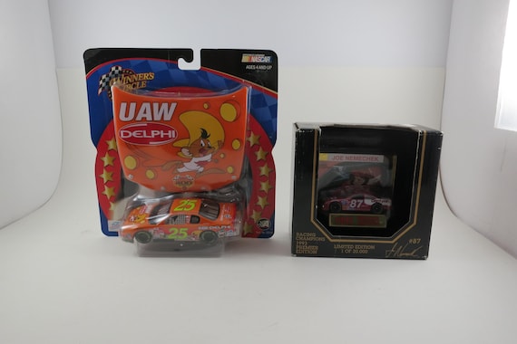 Vintage Joe Nemechek Die Cast Car Pair: Signed #87 & #25 UAW Delphi