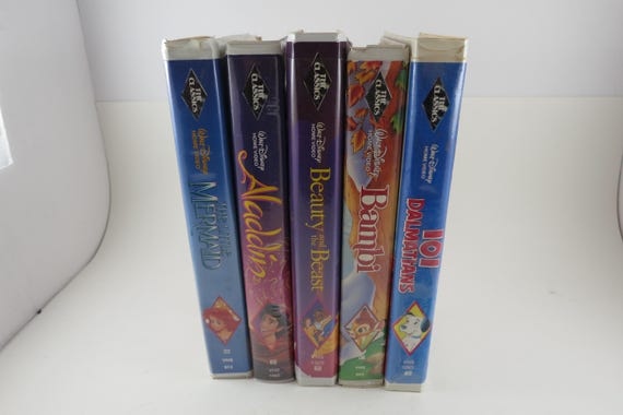 Collection of 5 Disney Black Diamond VHS Tapes Originals Bambi 101 Dalmatians Aladdin Clam Shell Cases Rare