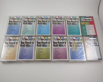 May include: A collection of vintage Billboard Top Rock'n' Roll Hits cassette tapes. The tapes feature colorful covers with the Billboard logo and the year of release. One tape is labeled "Christmas".