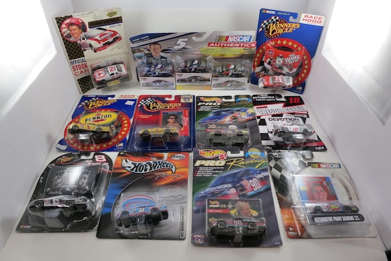 Collection of 11  NASCAR Die Cast Cars 1:64 Scale All New In Packages Kahne Park Stewart Marlin Bayne Truex Jr Biffle Trickle More