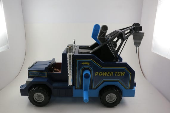 Vintage 1982 Fisher Price 338 Husky Helpers Wind Up Power Tow Truck 13 1/2 Inches Long Still Works Good Condition