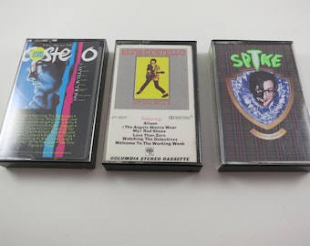 Vintage Elvis Costello Cassette Tape: 1980s Music (Sold Individually)