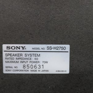 May include: A close-up of a label on a speaker system. The label reads "SONY" and "MODEL NO. SS-H2750". It also lists "SPEAKER SYSTEM", "RATED IMPEDANCE: 6&Omega;", and "MAXIMUM INPUT POWER: 70W". The serial number is 850631.