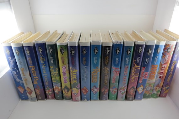 Collection of 17 Vintage Disney Black Diamond VHS Tapes Originals Aladdin Dumbo Cinderella Bambi Peter Pan More Clam Shell Cases Rare
