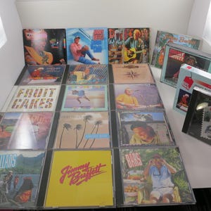 Jimmy Buffett CD&#39;s Beach House Early Years Storyteller Christmas Feeding Frenzy Live Songs You Know Many More Sold Individually