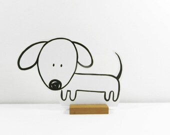 Wooden dachshund: Chuck the Chaser.