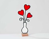 Wooden flowervase with hearts. Home decoration. Great gift!