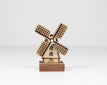 Wooden Dutch windmill with rotating blades