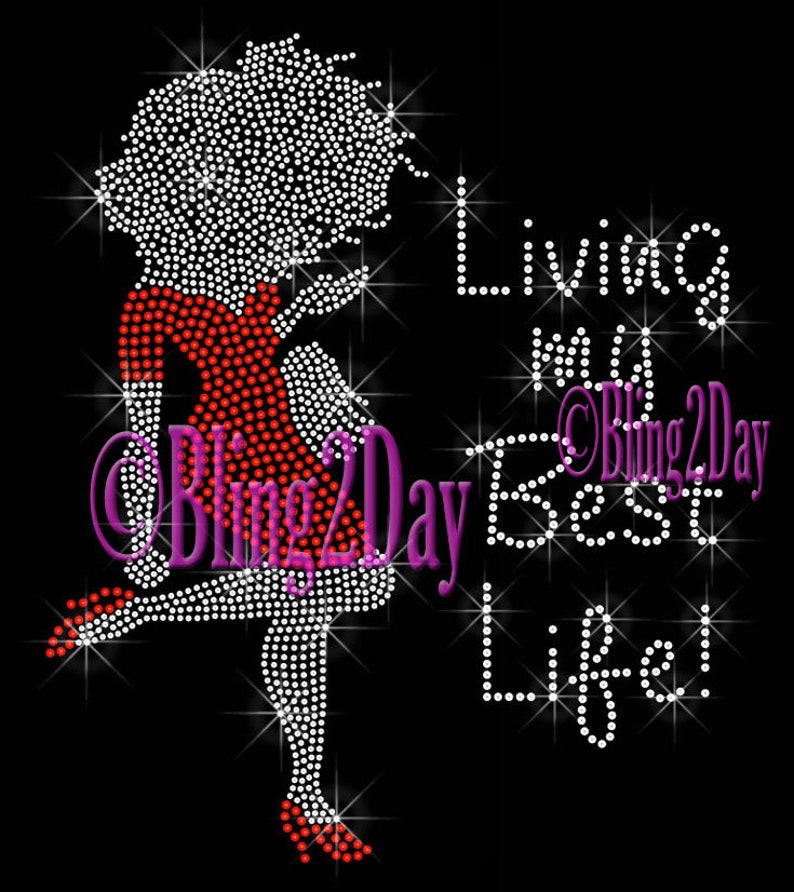 May include: Rhinestone design featuring a woman in a red dress with the text "Living my Best Life!" and the logo "Bling2Day".