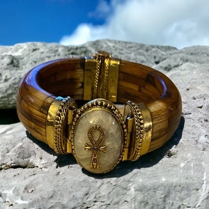 Ankh charm on a Moonstone w/ hinged bracelet. #StraightPathJewelry #AncientEgyptian #KemeticEgyptianJewelry