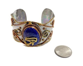 Egyptian Kemetic Jewelry! Eye of RA charm & Cuff Bracelet on a Large Lapis Lazuli stone. #StraightPathJewelry #AncientEgyptian