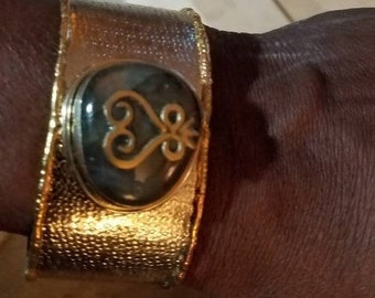 Egyptian Kemetic Jewelry! Labradorite stone/gold plated Sankofa Symbol on an astonishing Stainless Steel bracelet.