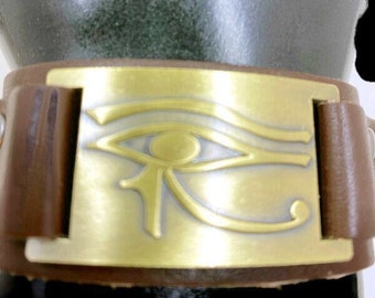 Egyptian Kemetic Jewelry! Adorable small to medium size Snap Bracelet with a Bronze Eye of Ra Charm. Gorgeous Egyptian-inspired Jewelry.
