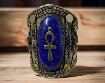 Women's History Month! 2024 Edition Brass coated Ankh charm Bracelet on a large Lapis Lazuli Stone. #StraightPathJewelry #EgyptianJewelry