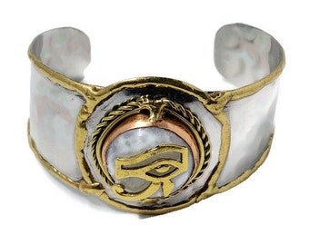 Women History Month! Magnificent Cuff Bracelet with Ancient Egyptian Eye of Ra charm on a Moonstone gemstone. #EgyptianJewelry #AncientEgypt