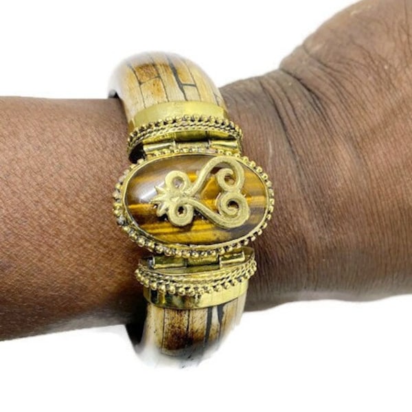 Ghana/Asante Sankofa charm with a Tiger's Eye gemstone on a hinged bracelet. #StraightPathJewelry #Afrocentric #Adinkra