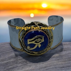 Eye of Ra charm on a Lapis Lazuli gemstone bracelet. #AncientEgyptian #EgyptianKemeticJewelry #EyeOfRa #EyeOfHorus #LapisLazuli