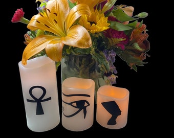 Ankh, Eye of Ra, and Queen Nefertiti profile LED battery-operated flickering candles #EgyptianKemeticJewelry #Candle