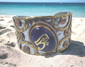Impressive Eye of RA/Amethyst gemstone Cuff Bracelet. #EyeofRa #EyeofHorus #EgyptianJewelry #EgyptianKemeticJewelry #AncientEgypt