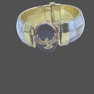 Maat charm/Black agate stone on a Mother of Pearl hinged bracelet. Ancient Egyptian.