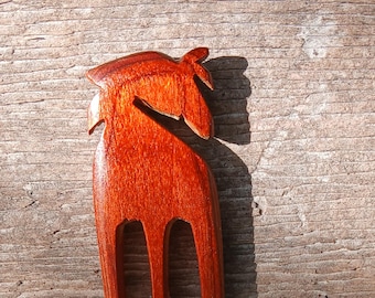 3 prong horsehead wooden hair comb . hand shaped of colored hardwoods.