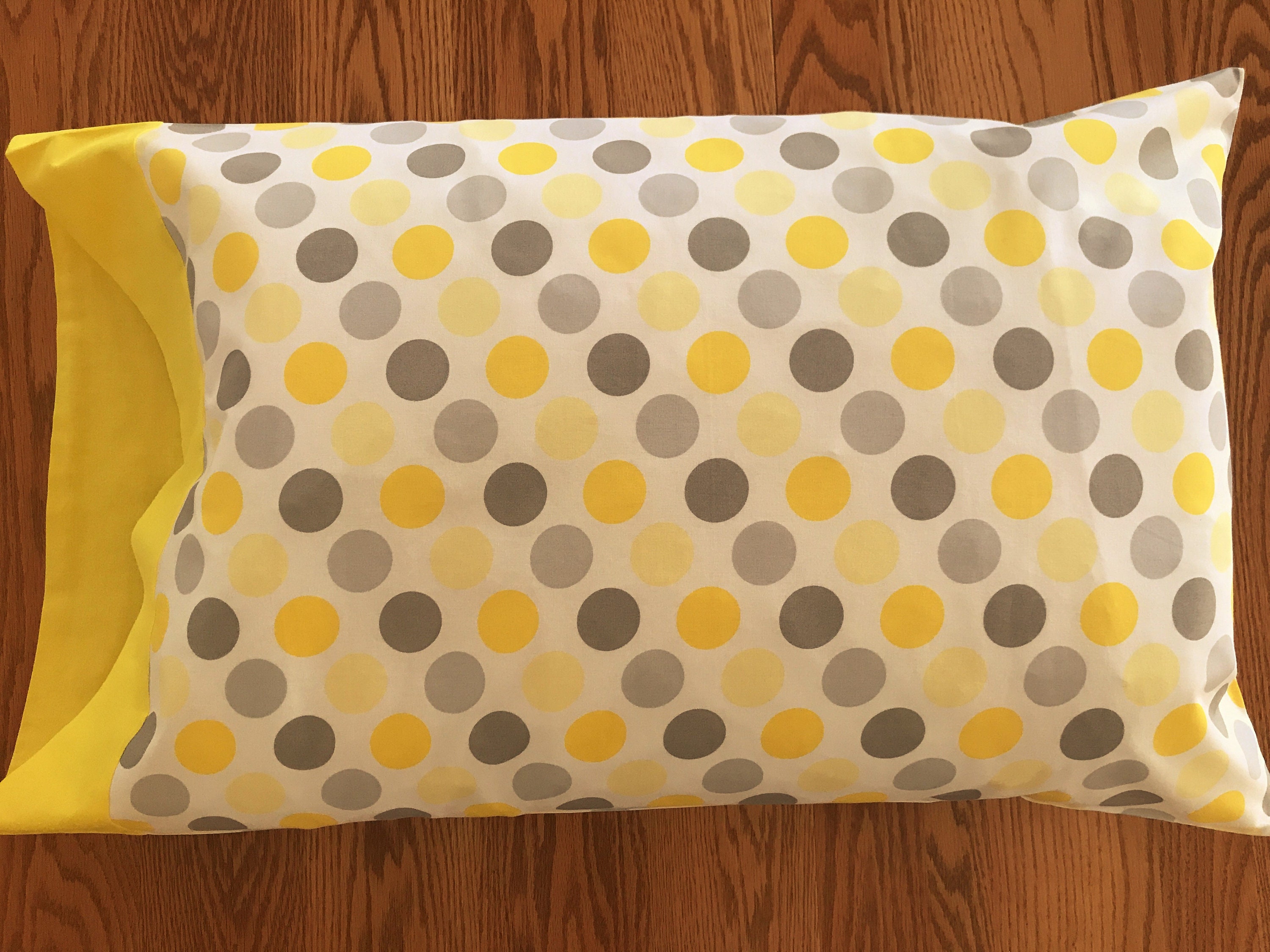 gold polka dot pillowcase