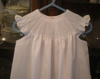 Ready to smock dress with angel sleeves. Made to order
