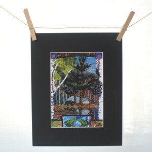 May include: A framed print of a colourful, abstract landscape with trees, water, and a blue sky. The print is surrounded by a black mount and a white frame.