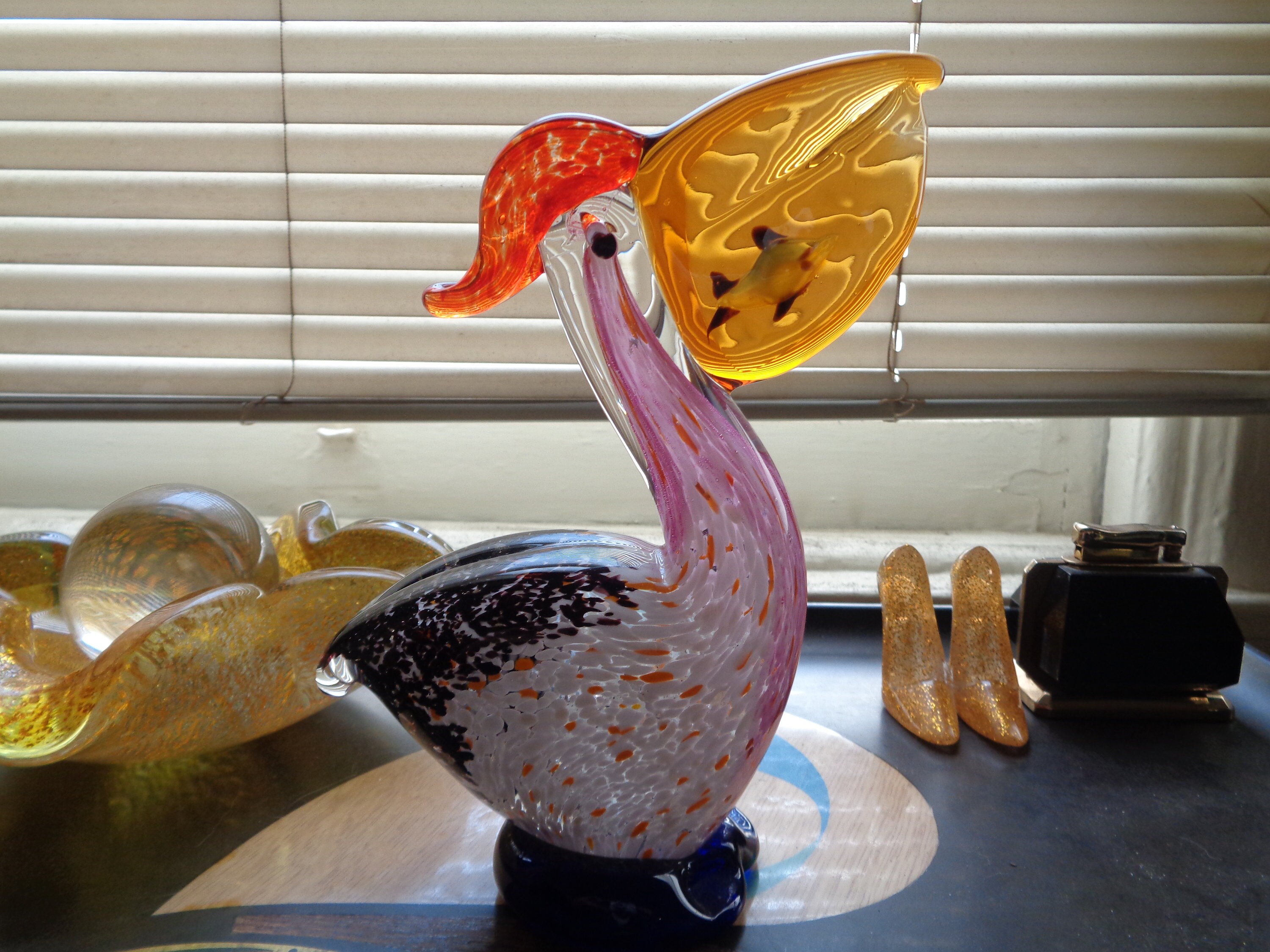 Murano glass pelican with fish in mouth Etsy
