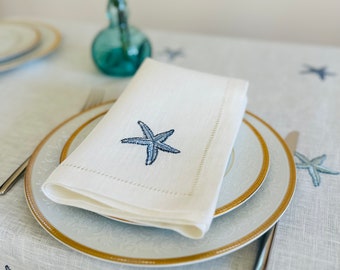 Linen napkins with starfish embroidery in blue