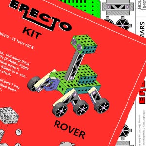 May include: A red and white papercraft model of a green and black rover with the text "ERECTO KIT" and "ROVER" on the page. The instructions say to cut along thick lines with an X-Acto knife and apply glue to assemble the parts.