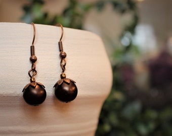 Red beaded acorn drop earrings