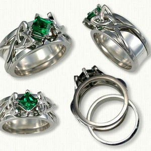 May include: Two silver wedding bands with a Celtic knot design. The top band features a green emerald gemstone.