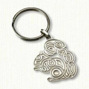 May include: A silver key chain with a detailed, intricate design of a squirrel. The squirrel is made of metal and has a Celtic knot-like pattern.