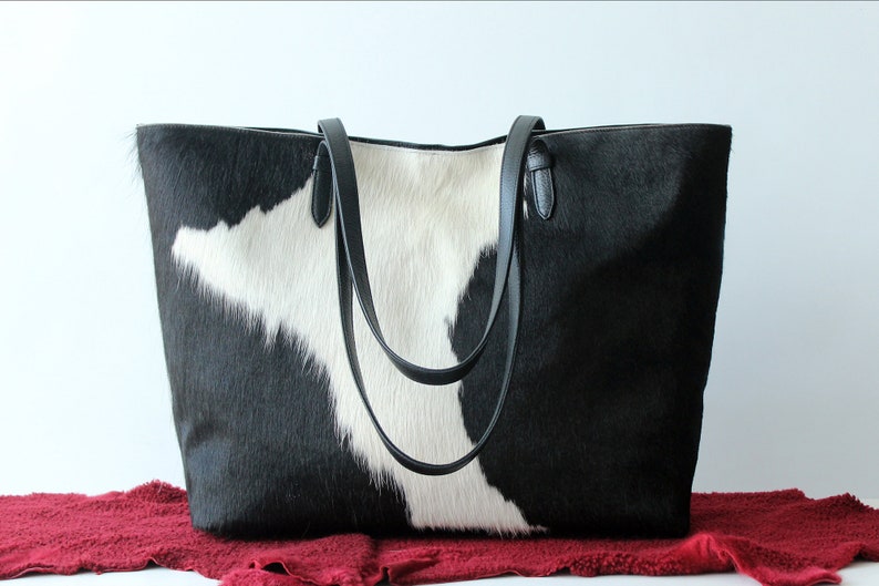 COWHIDE BAG in Black and White Hair on Hide. Weekender Bag / image 0