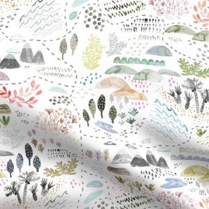 May include: A white fabric with a repeating pattern of a whimsical map. The map features mountains, trees, water, and other natural elements in shades of blue, green, orange, and pink. The map is outlined in a dashed line.