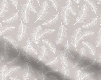 May include: A seamless fabric pattern featuring white feather silhouettes on a light gray background. The pattern is repeated throughout the fabric.