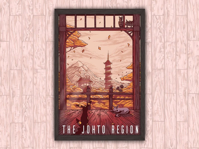 May include: A framed illustration of a Japanese-inspired landscape with a pagoda in the background. The scene is framed by a wooden structure with a view of a mountain range. The text "THE JOHTO REGION" is at the bottom of the image.