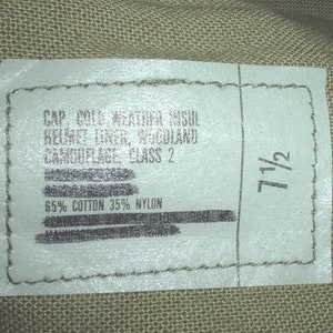 US Army woodland camouflage helmet liner size 7-1/2; blacked out tag; great shape