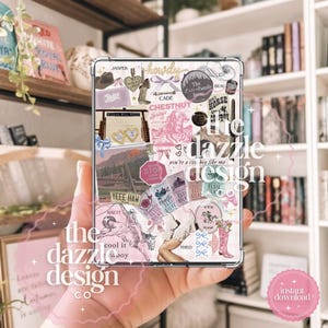 May include: Clear phone case with a collage design featuring cowboy-themed graphics in pink and white. The design includes text such as "Howdy", "Yee Haw", and "Elsie Silve". The case is from "The Dazzle Design Co."